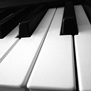 Playing Piano With Chords logo
