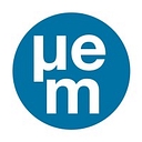 EM Microelectronic logo