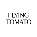 Flying Tomato logo