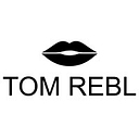Tom Rebl logo