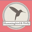 Hummingbird and Holly logo