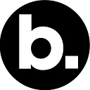 B. Tan logo