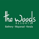 The Woods Resorts logo