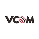 VCOM logo